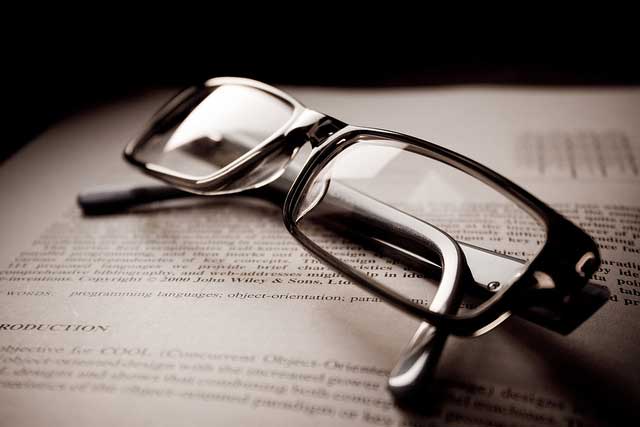 Glasses resting on a book